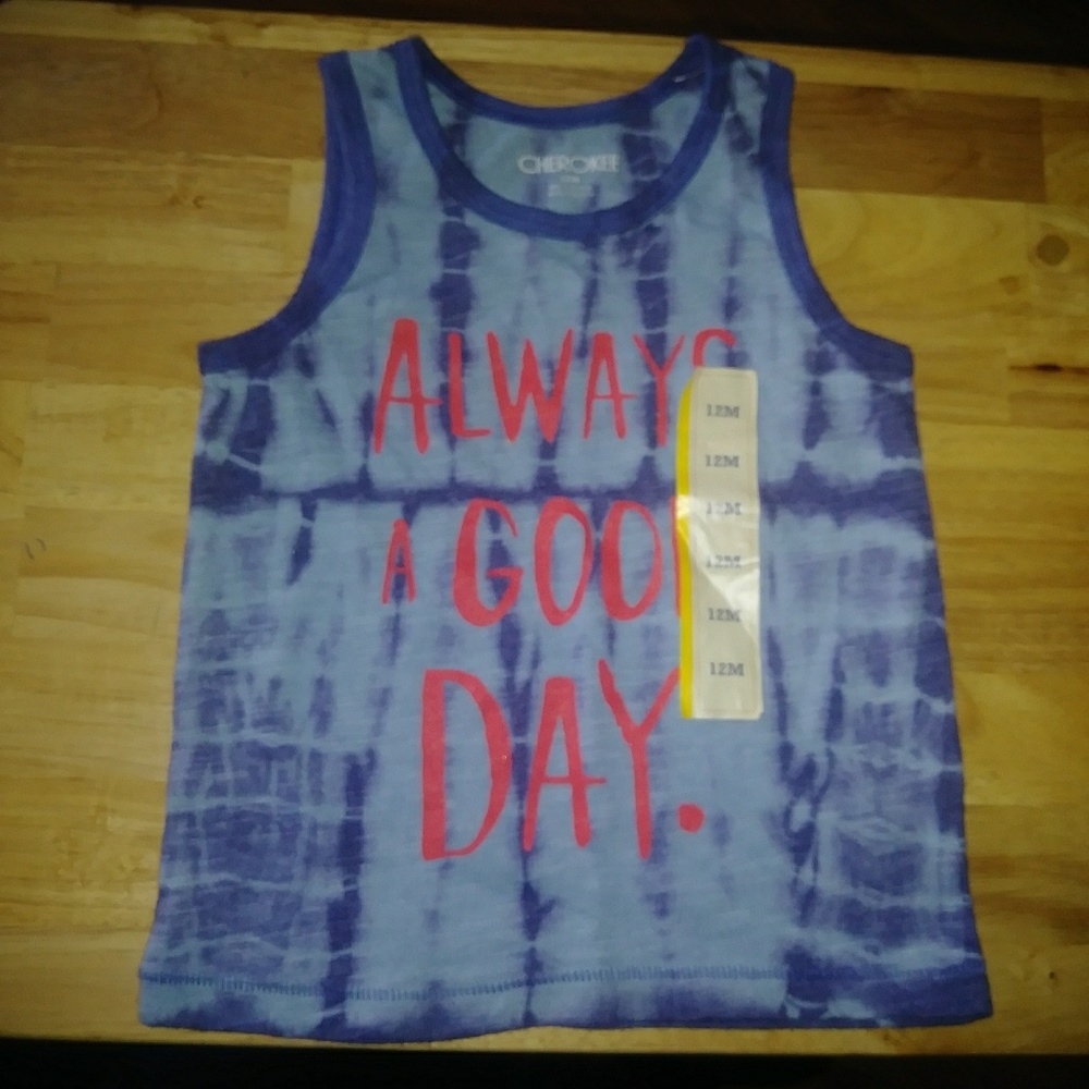 Never worn Blue boys sleeveless shirt.